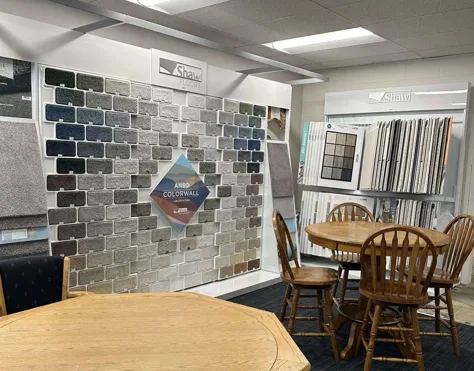 Shaw ColorWall carpet display with consultation table